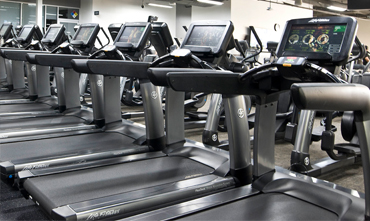 Fitness Floor at Villa Sport Fitness featuring treadmills